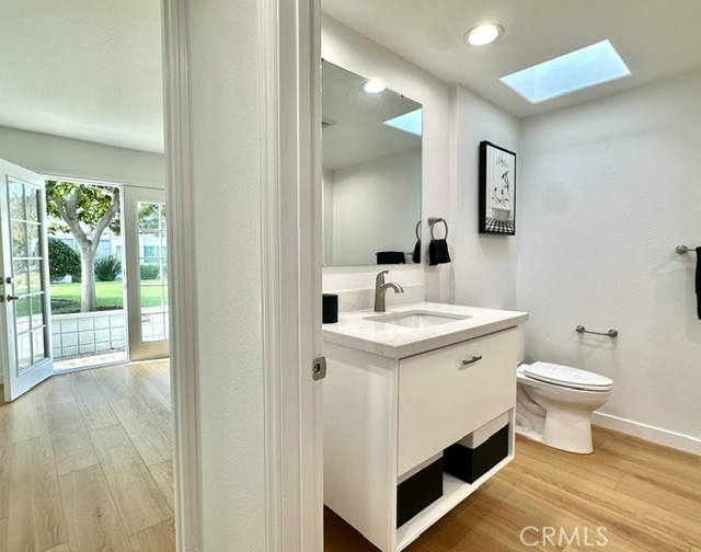 1921 St John Road, Unit 35C Seal Beach, CA 90740 - Photo 5 of 11 a bathroom with a sink and a mirror