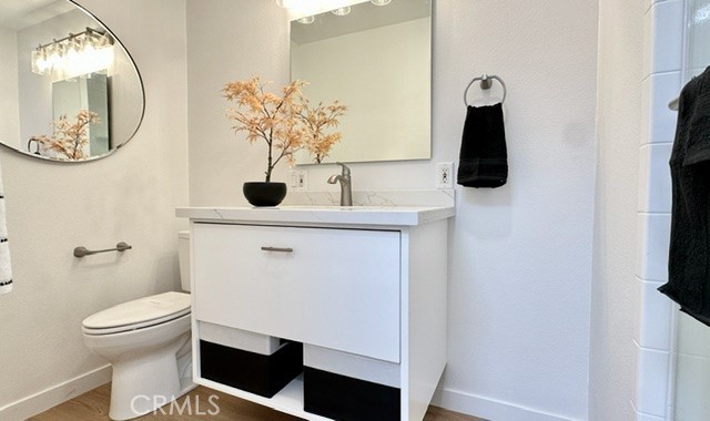 1921 St John Road, Unit 35C Seal Beach, CA 90740 - Photo 6 of 11 a bathroom with a toilet and a sink