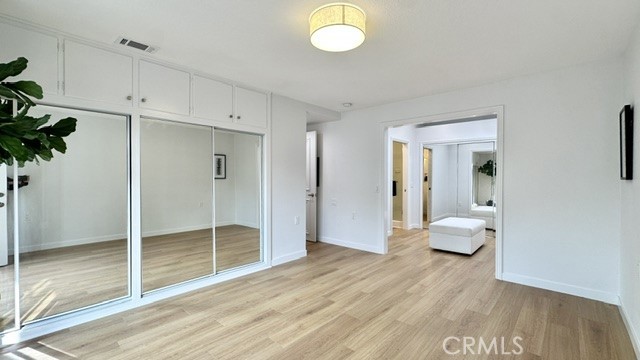 1921 St John Road, Unit 35C Seal Beach, CA 90740 - Photo 7 of 11 a view of empty room with wooden floor