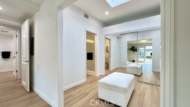 1921 St John Road, Unit 35C Seal Beach, CA 90740 - Photo 8 of 11 a living room with furniture and a gate