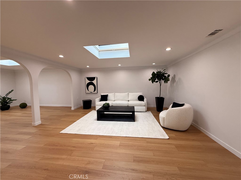 1921 St John Road, Unit 35C Seal Beach, CA 90740 - Photo 10 of 40 a living room with furniture and a couch