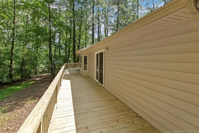 a balcony with view of trees