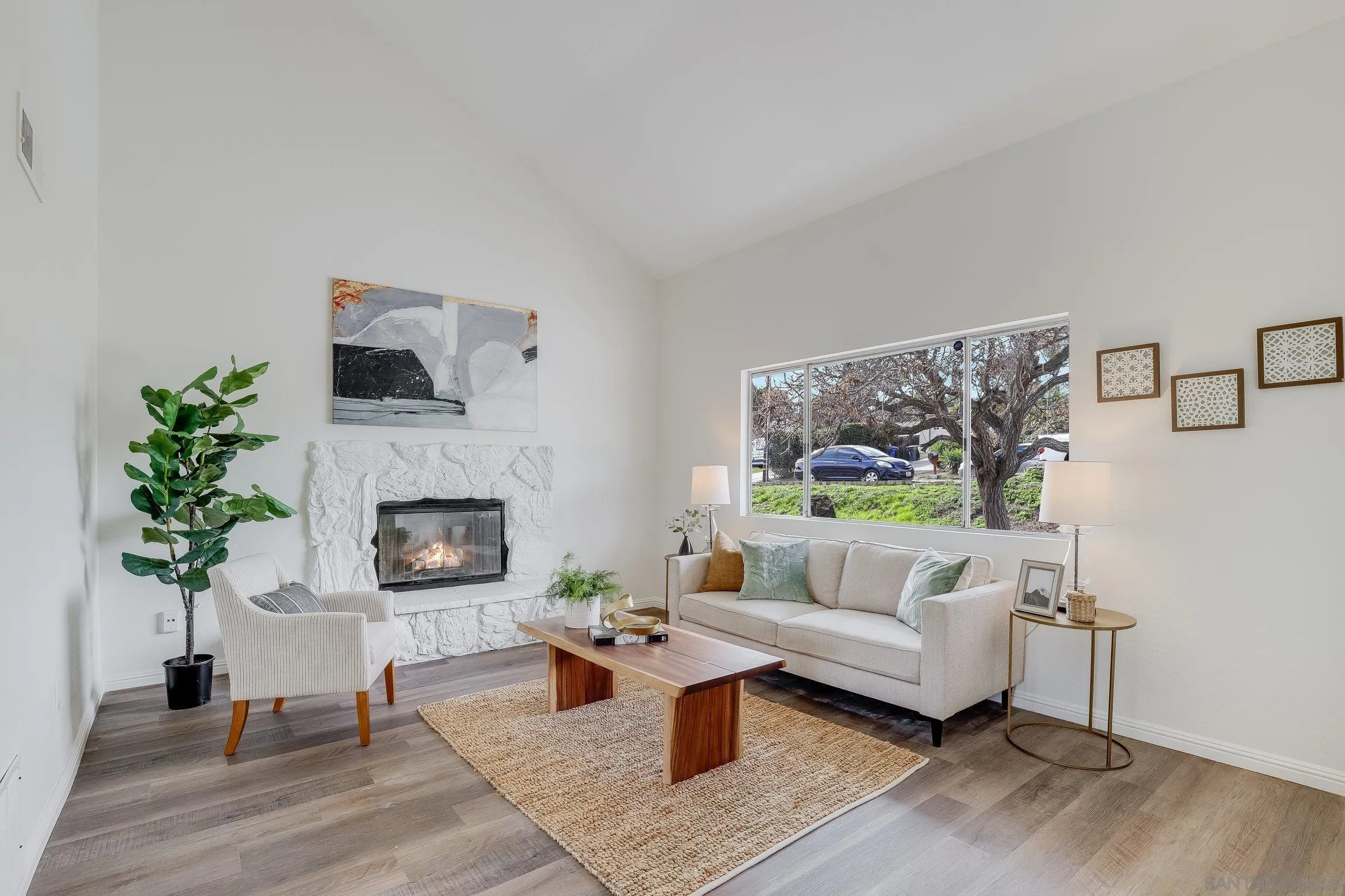 2305 Peppermint Lane Lemon Grove, CA 91945 - Photo 2 of 25 a living room with furniture and a fireplace