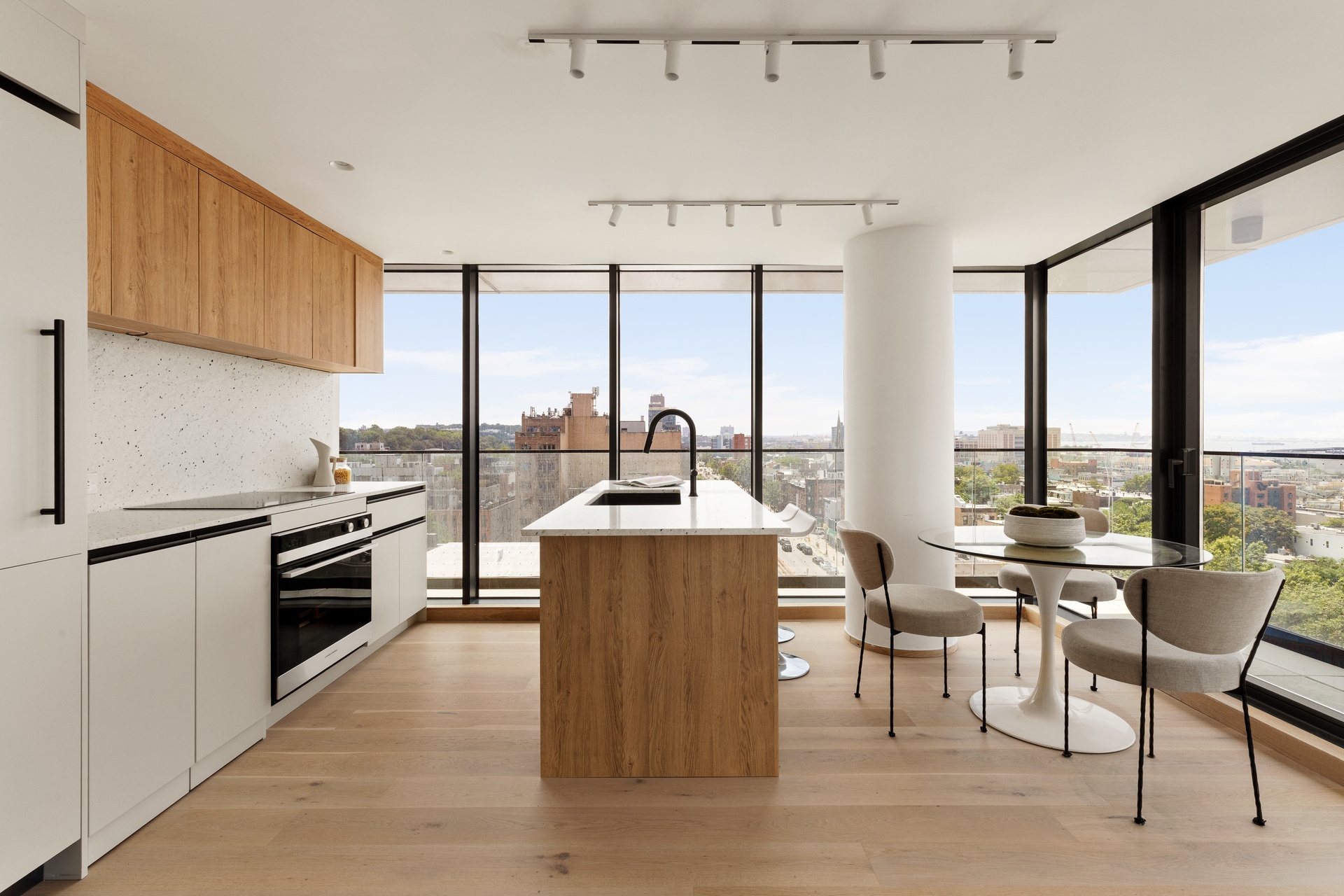 179 20th Street, Unit 4A Brooklyn, NY 11232 - Photo 4 of 12 a kitchen with stainless steel appliances a stove a sink dishwasher and a refrigerator