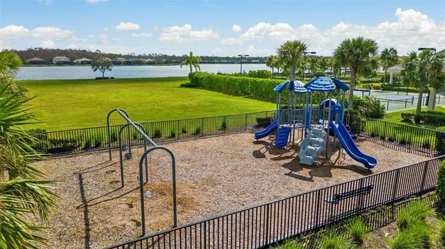 a view of an outdoor space and tennis court