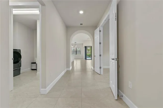 a view of an empty room with a window