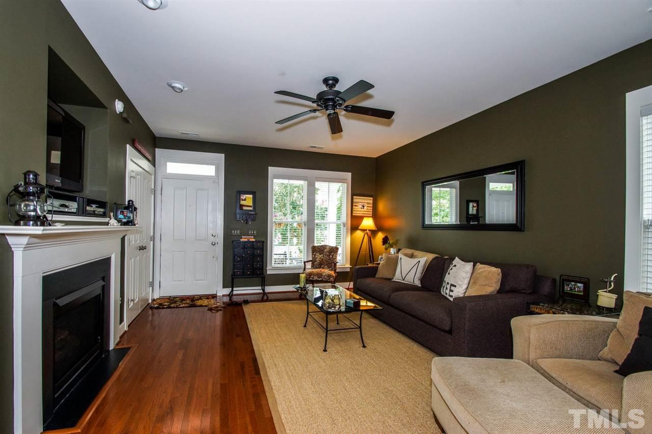 2244 Dunlin Lane Raleigh, NC 27614 - Photo 6 of 23 a living room with furniture and a fireplace