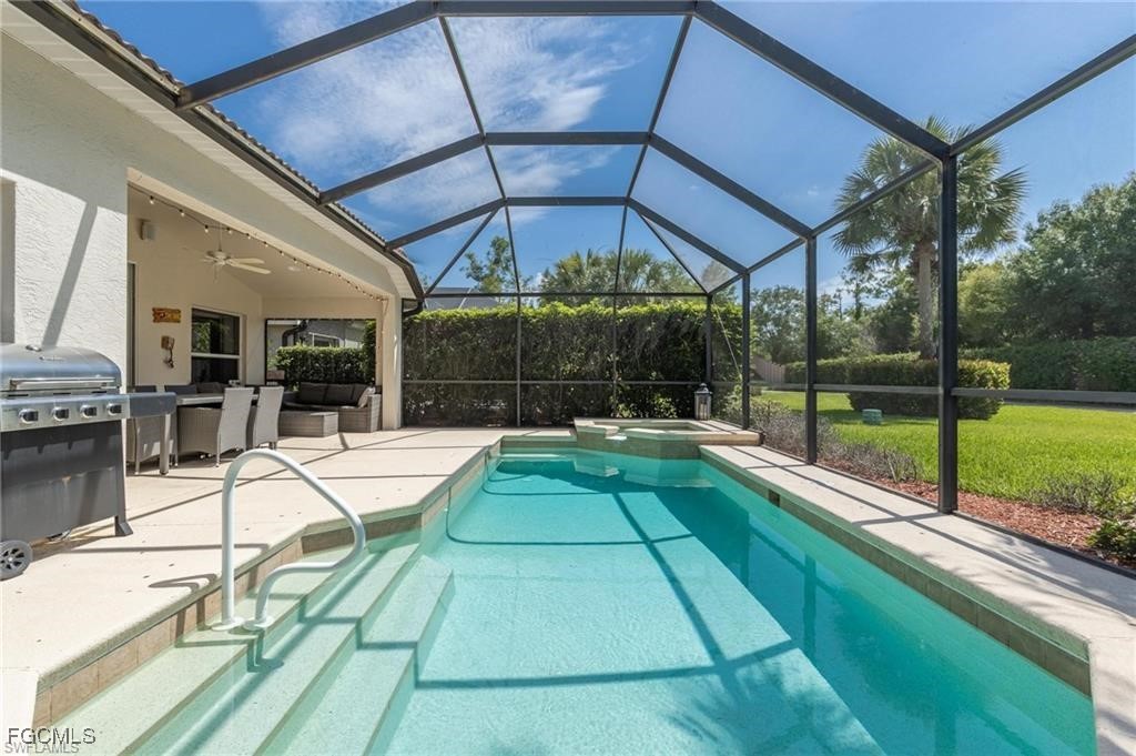10074 Oakhurst Way Fort Myers, FL 33913 - Photo 18 of 32 a view of swimming pool with seating area and furniture