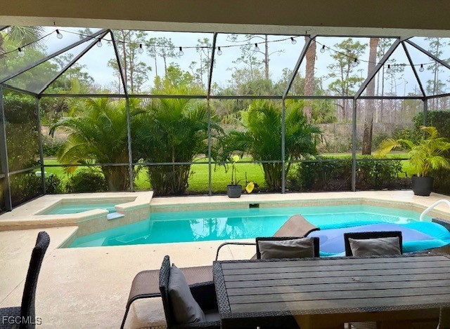 10074 Oakhurst Way Fort Myers, FL 33913 - Photo 20 of 32 a view of an outdoor sitting area with furniture
