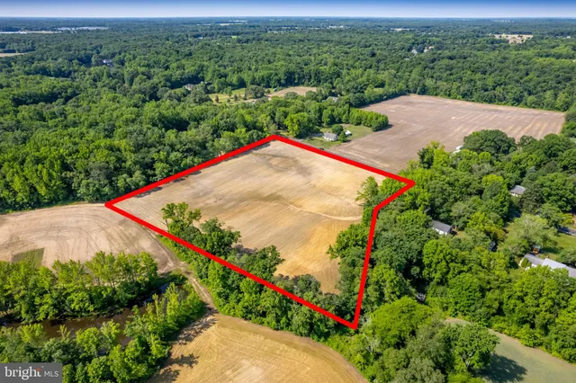 an aerial view of a house with a garden