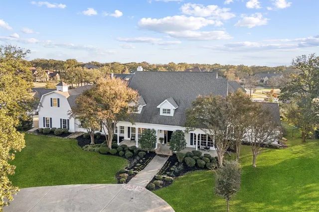 aerial view of a house with a garden
