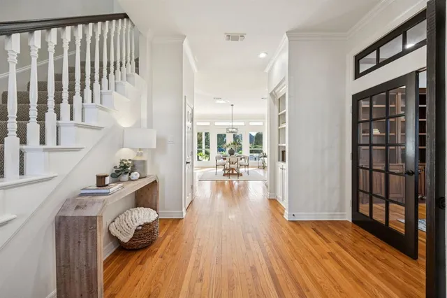 a view of a living room and hardwood floor
