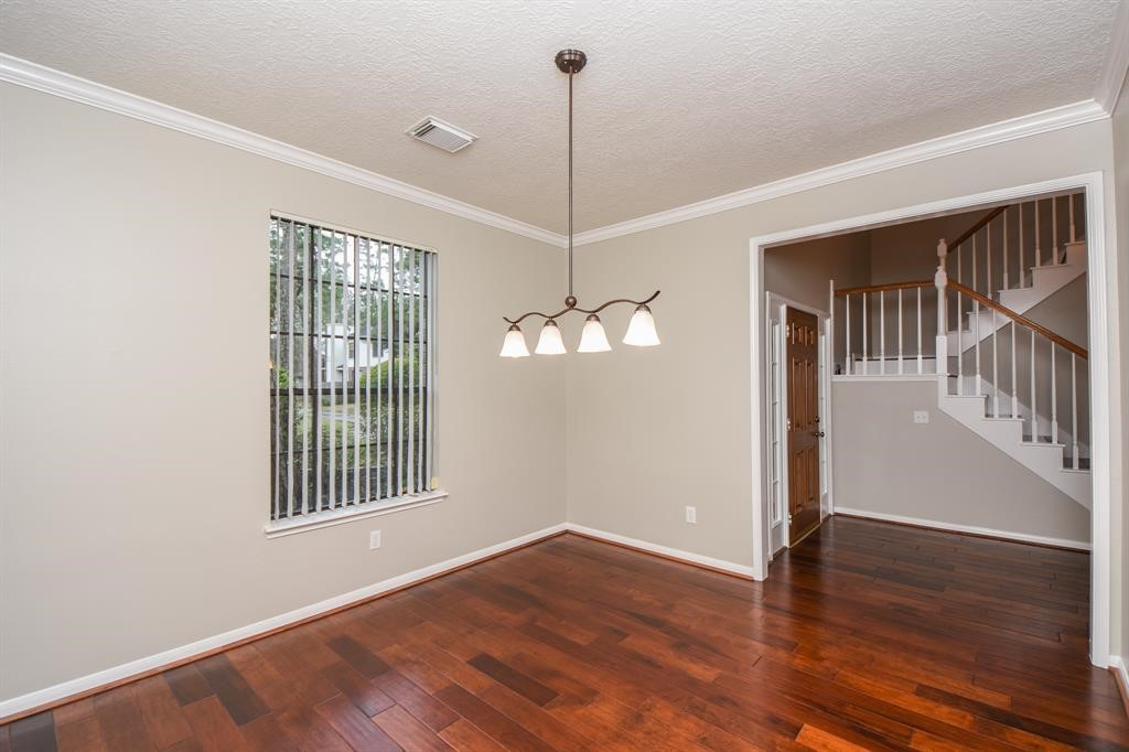 27 West Rumple Creek Place Spring, TX 77381 - Photo 6 of 32 Gather friends and family in this inviting dining room.