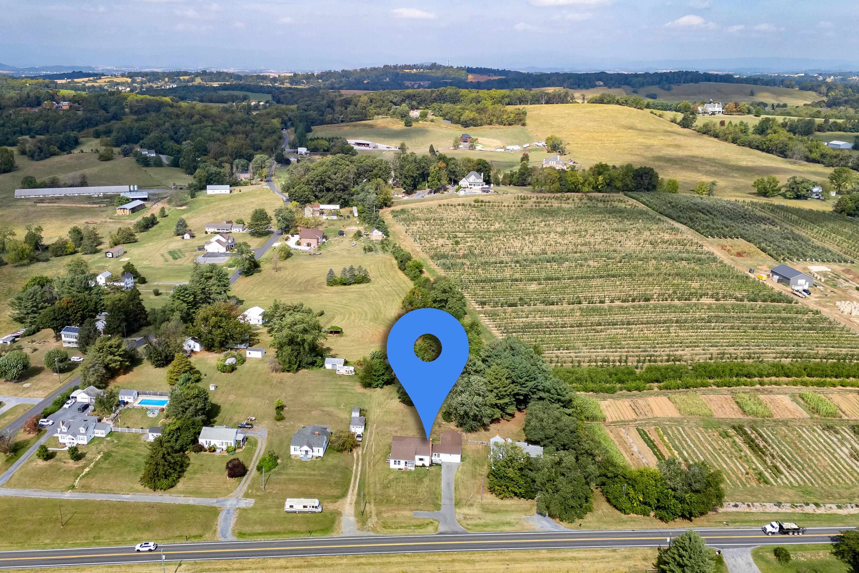 3138 Cross Keys Road Harrisonburg, VA 22801 - Photo 69 of 74 The aerial view highlights the overhead view of the spacious lot, farmland nearby the home, mountains offering beautiful views, and much more!