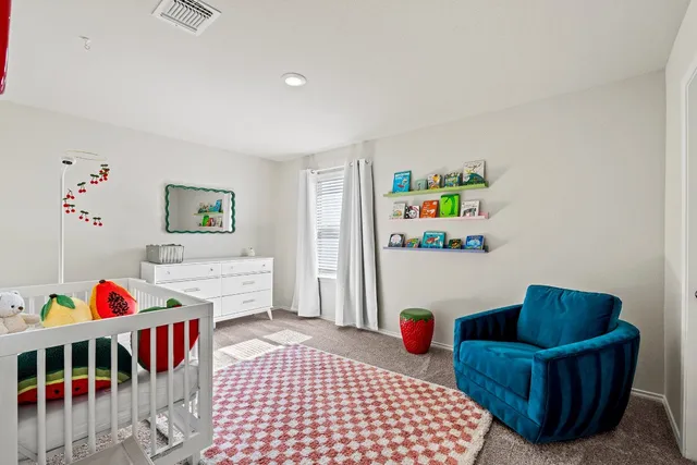 a bedroom with furniture and a couch