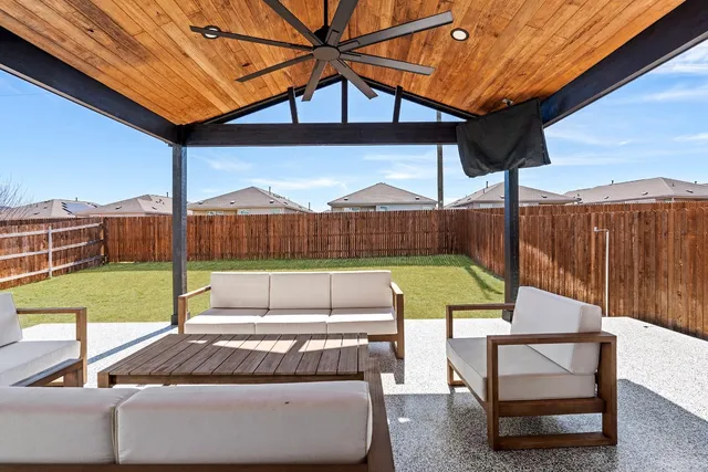 a view of a yard with a patio