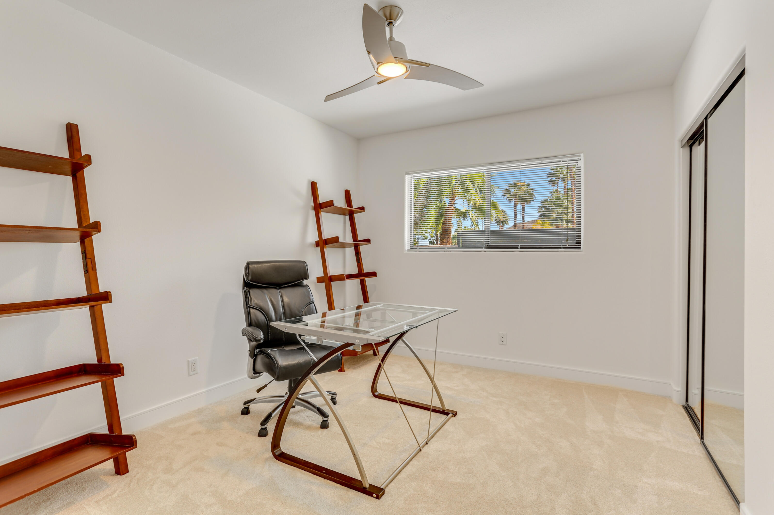 71480 Halgar Road Rancho Mirage, CA 92270 - Photo 18 of 52 a view of a workspace with furniture and a window