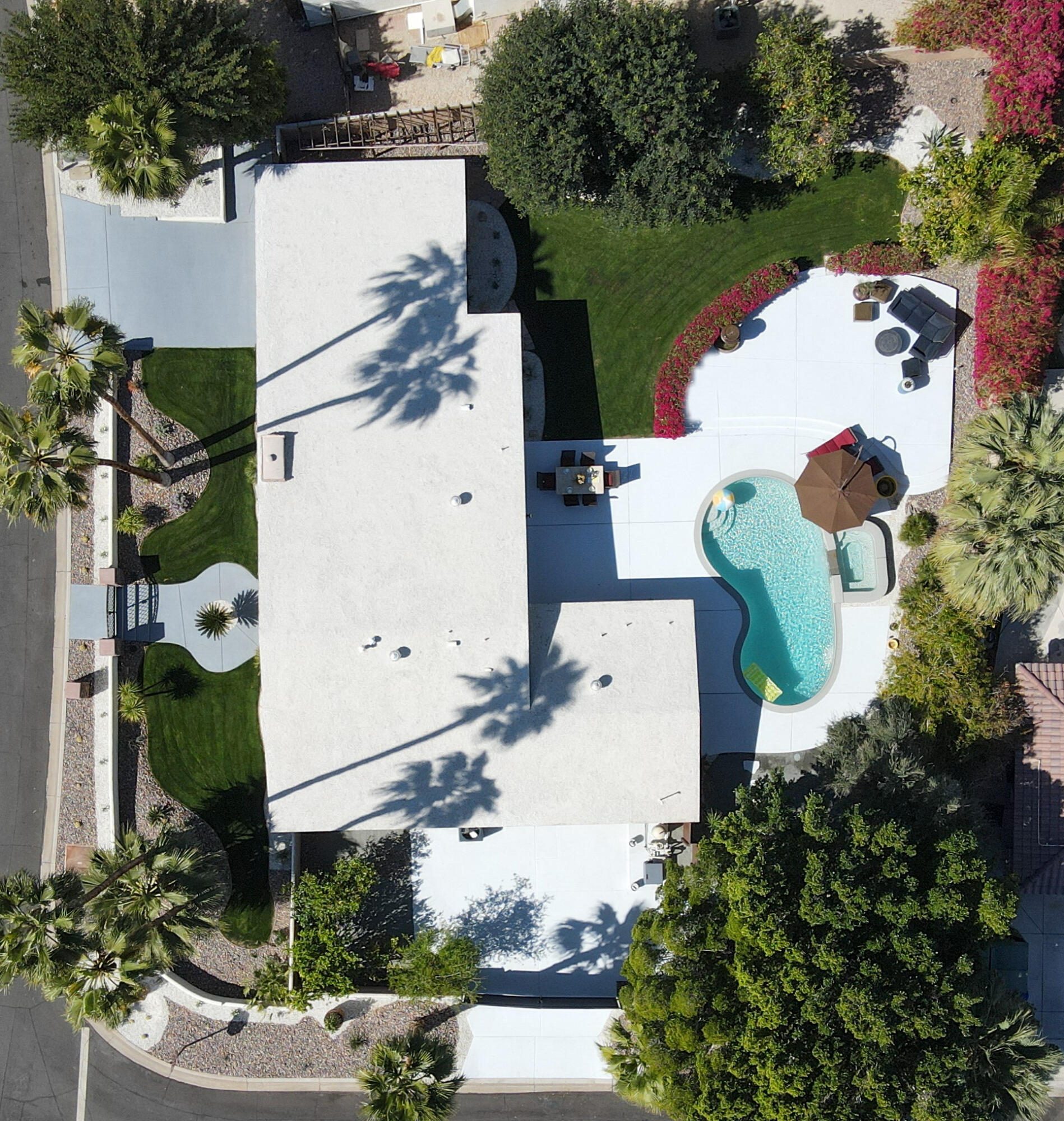 71480 Halgar Road Rancho Mirage, CA 92270 - Photo 40 of 52 an aerial view of a house with outdoor space and lake view