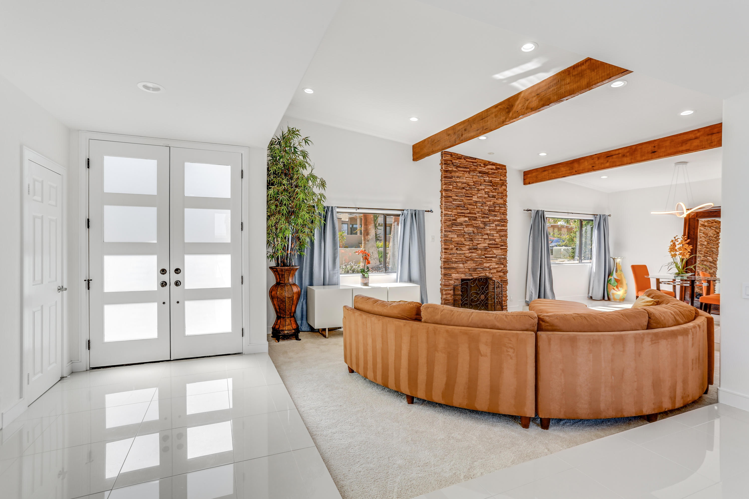 71480 Halgar Road Rancho Mirage, CA 92270 - Photo 5 of 52 a living room with furniture and a fireplace