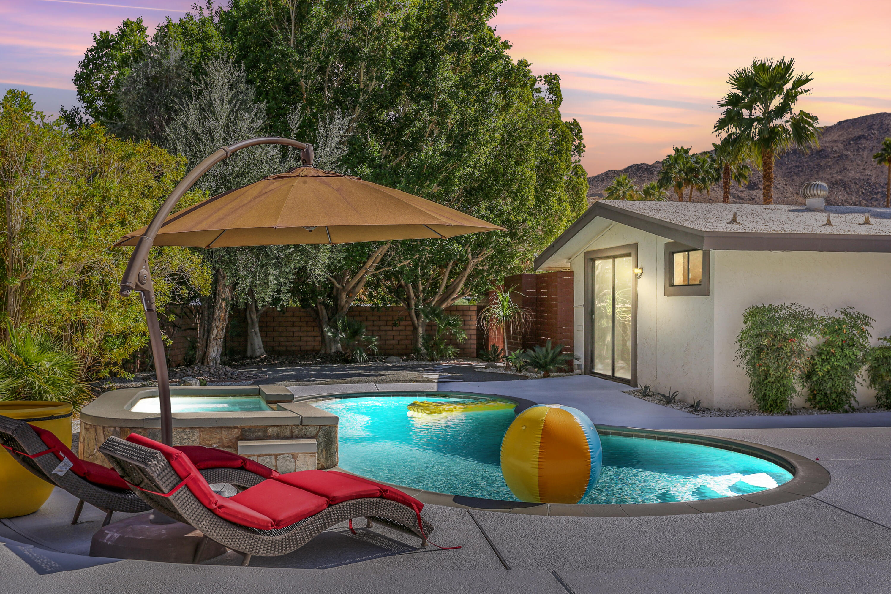 71480 Halgar Road Rancho Mirage, CA 92270 - Photo 51 of 52 a view of backyard with swimming pool and outdoor seating