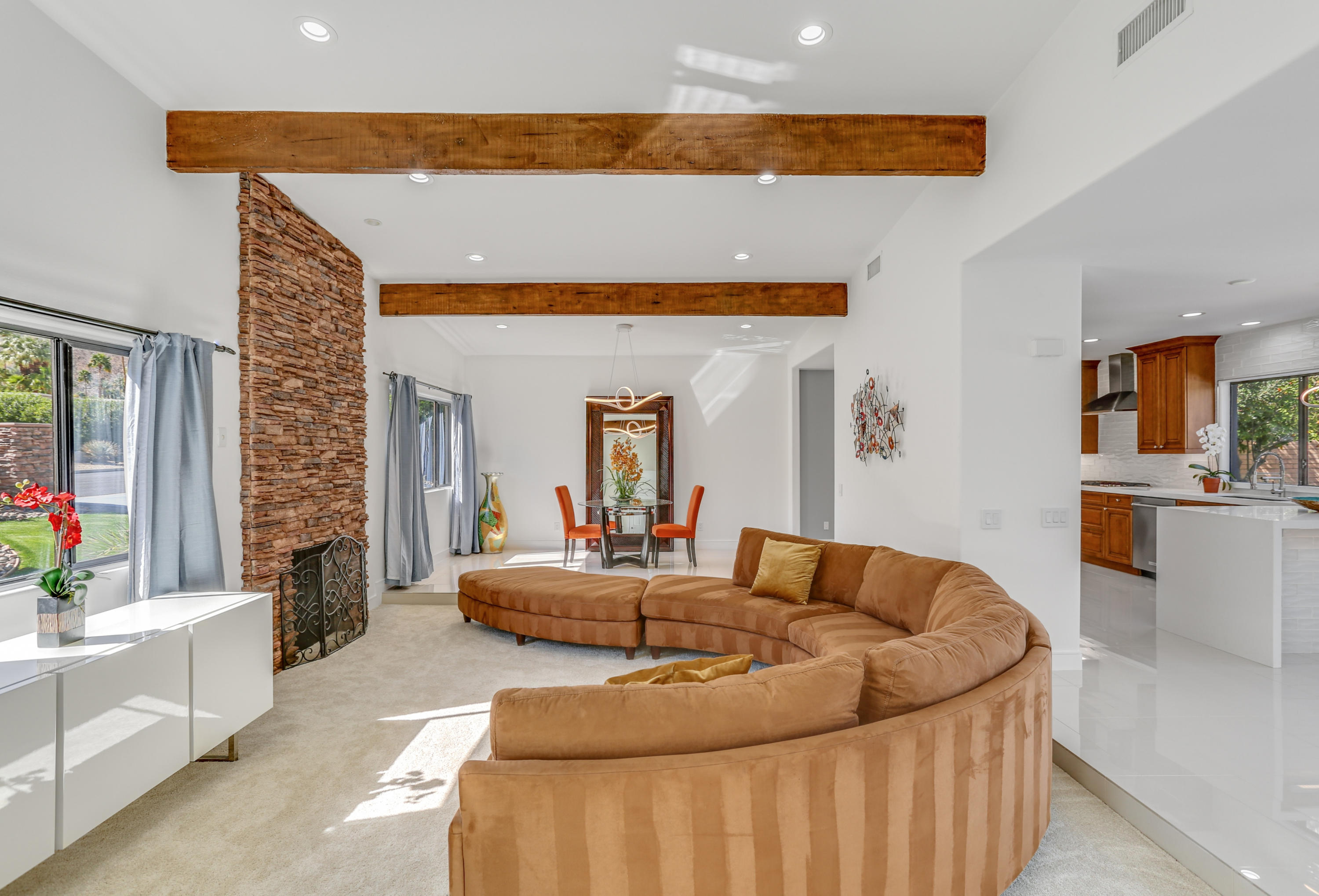 71480 Halgar Road Rancho Mirage, CA 92270 - Photo 7 of 52 a living room with furniture and a couch