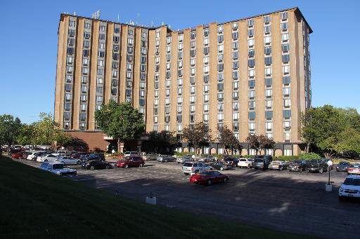 1 Renaissance Place, Unit 1212 Palatine, IL 60067 - Photo 1 of 28 a city street lined with buildings and cars parked in front of it