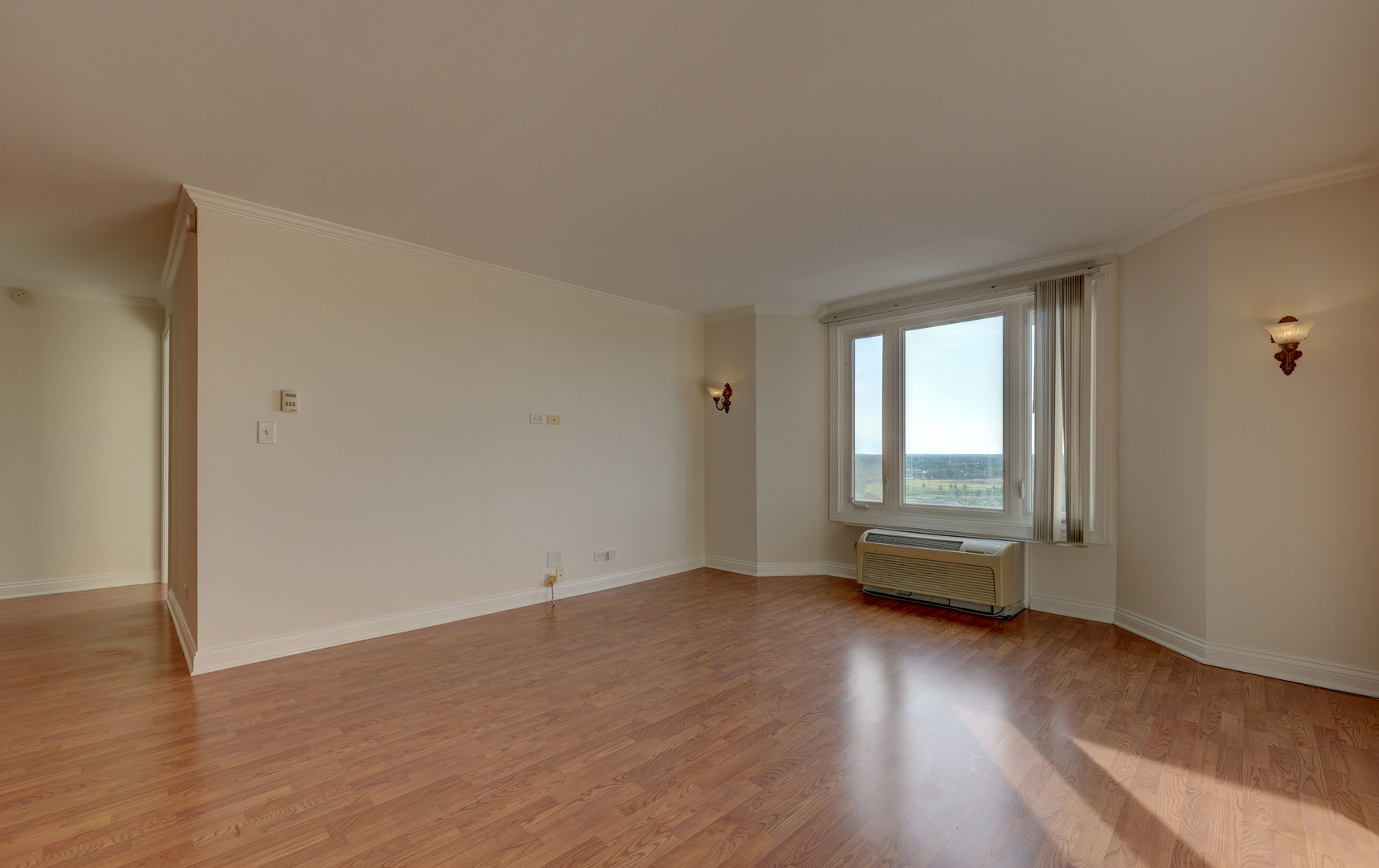 1 Renaissance Place, Unit 1212 Palatine, IL 60067 - Photo 12 of 28 an empty room with wooden floor and windows