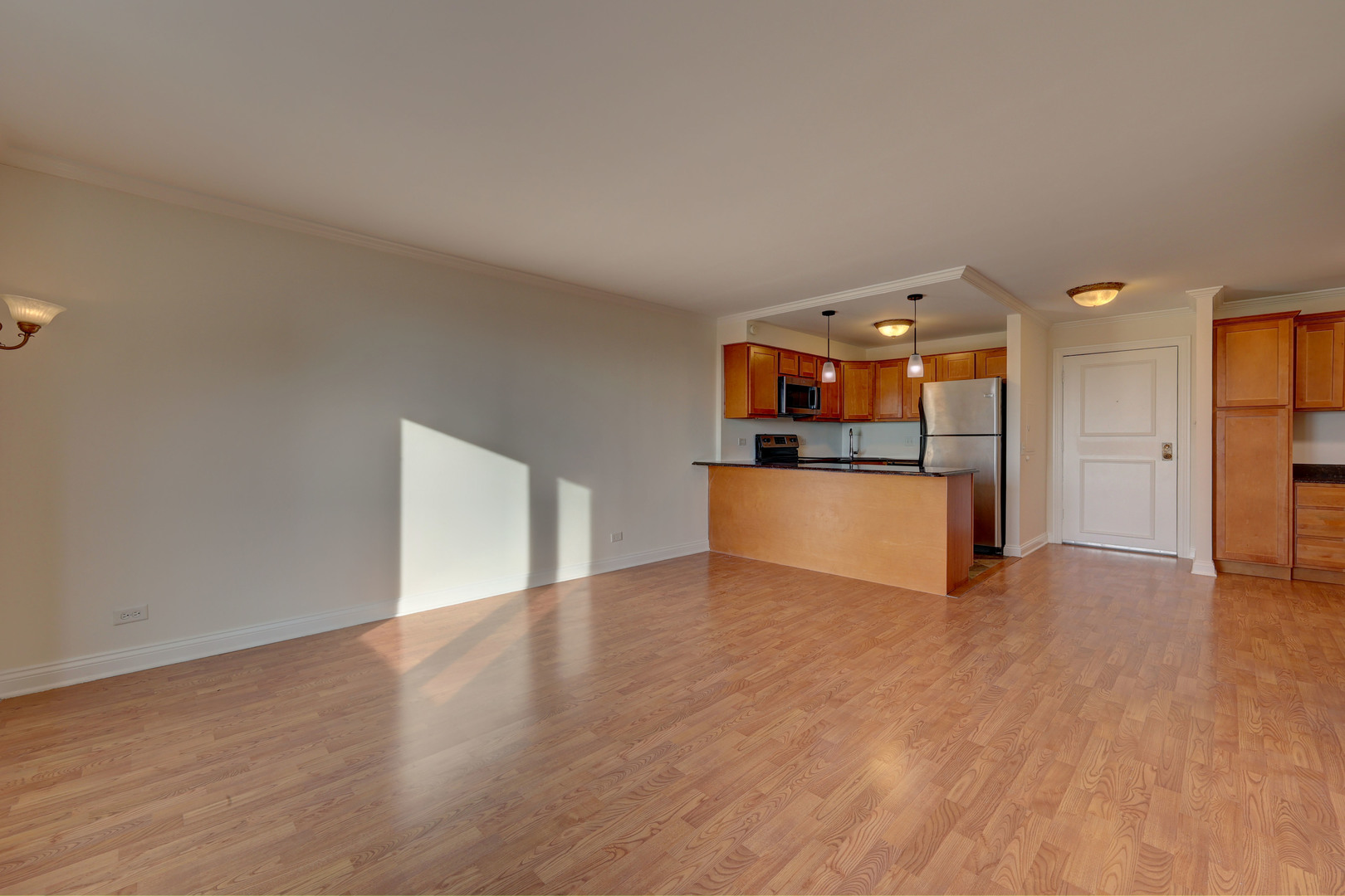 1 Renaissance Place, Unit 1212 Palatine, IL 60067 - Photo 14 of 28 a view of a kitchen with a sink and a refrigerator