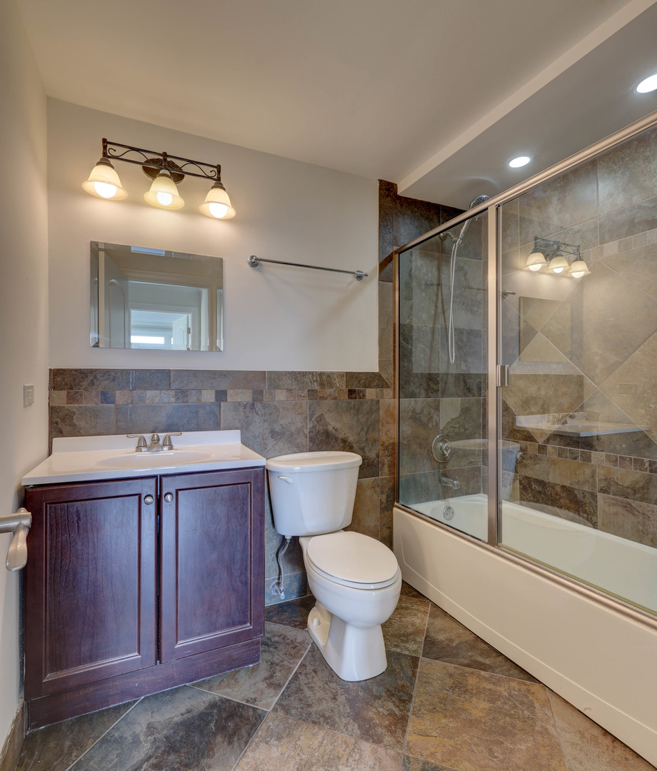 1 Renaissance Place, Unit 1212 Palatine, IL 60067 - Photo 15 of 28 a bathroom with a sink toilet and shower