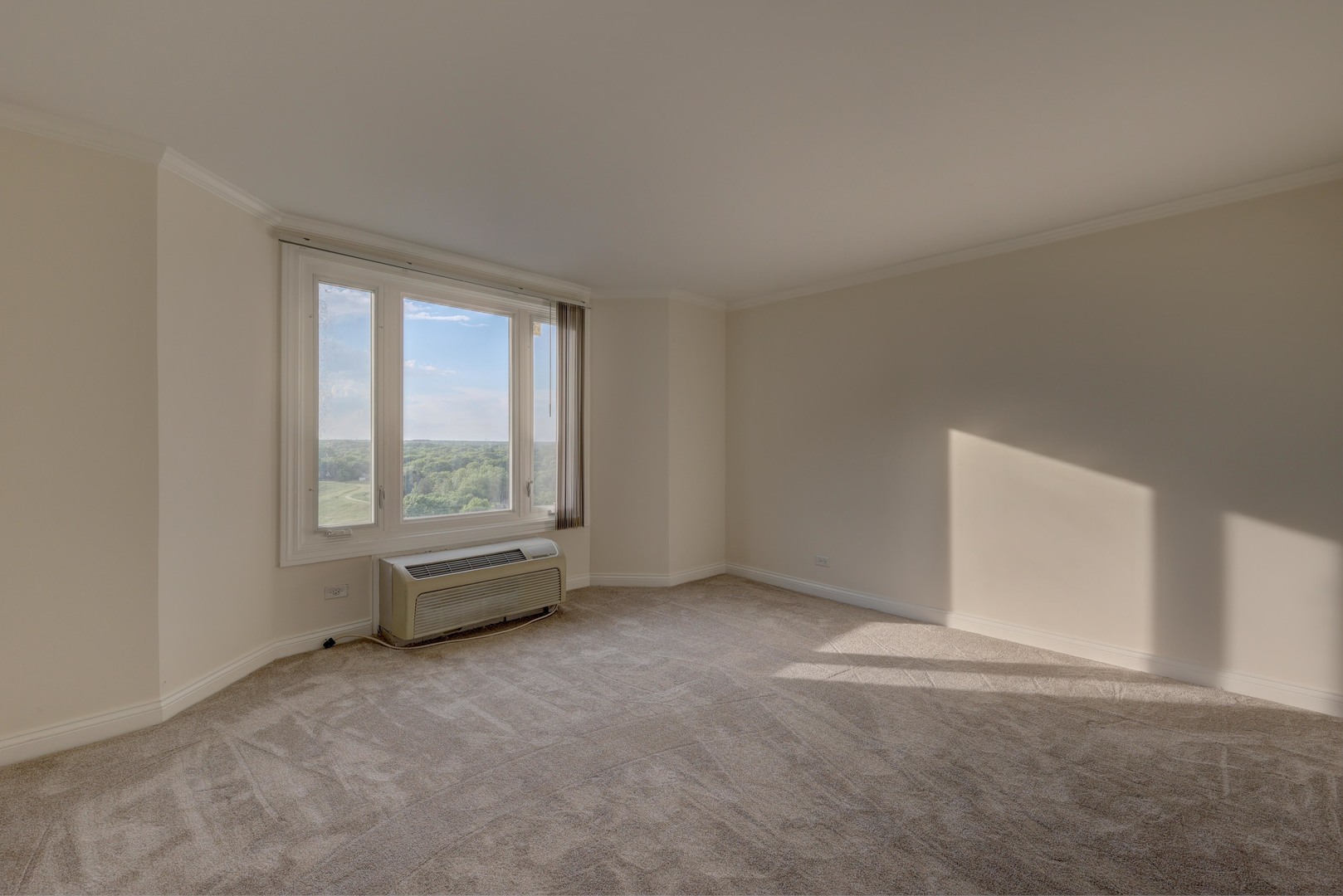 1 Renaissance Place, Unit 1212 Palatine, IL 60067 - Photo 18 of 28 an empty room with a empty space and window