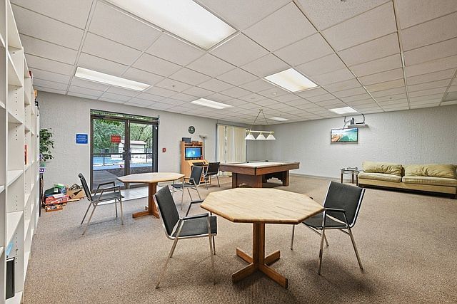 1 Renaissance Place, Unit 1212 Palatine, IL 60067 - Photo 21 of 28 a view of a livingroom with furniture and a window