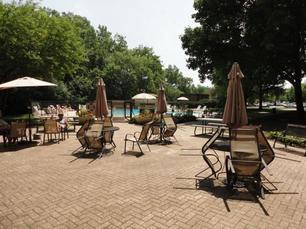 1 Renaissance Place, Unit 1212 Palatine, IL 60067 - Photo 26 of 28 a view of a backyard with sitting area and furniture