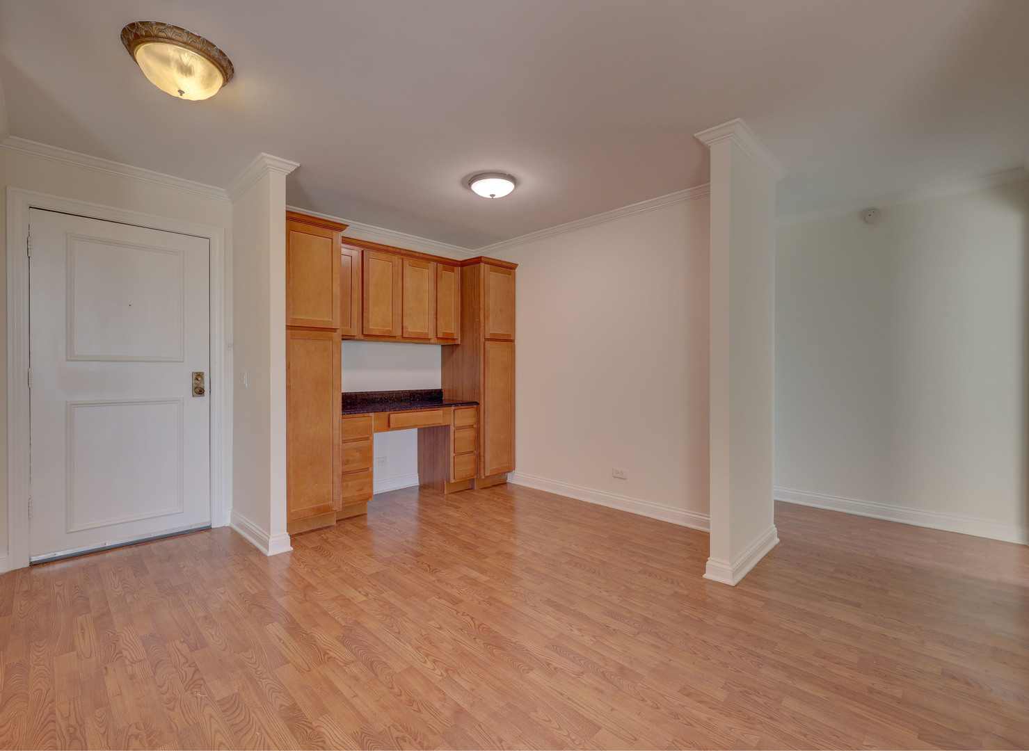 1 Renaissance Place, Unit 1212 Palatine, IL 60067 - Photo 7 of 28 a view of a kitchen with a sink and a refrigerator