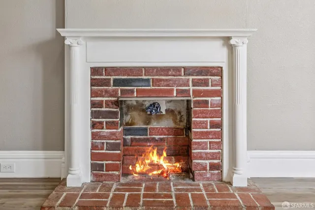 a kitchen that has a sink and a stove