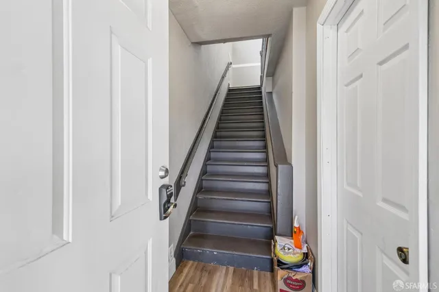 a view of a hallway with entryway