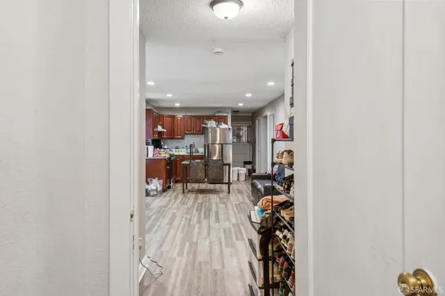 a bedroom with a bed and a mirror