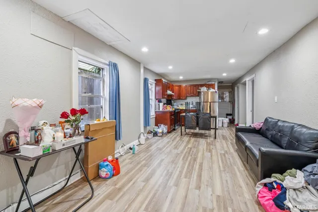 a bathroom with a sink a toilet and bathtub