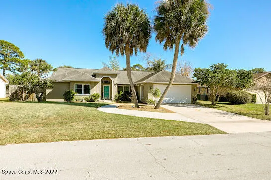 a view of a house with a swimming pool
