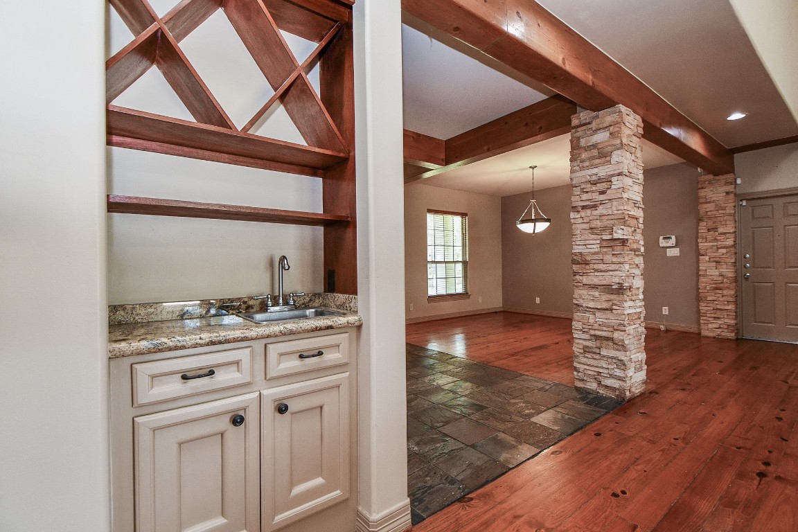 1240 Bingle Road Spring Valley Village, TX 77055 - Photo 12 of 49 Here is a beverage bar that has it' own sink and an space for wines or whatever you want to display.
