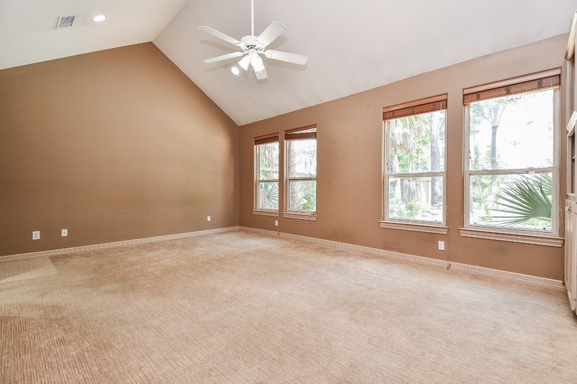1240 Bingle Road Spring Valley Village, TX 77055 - Photo 16 of 49 an empty room with chandelier fan and windows