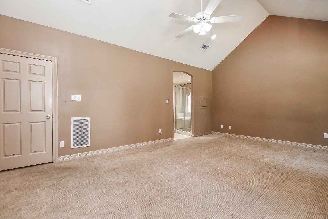 1240 Bingle Road Spring Valley Village, TX 77055 - Photo 17 of 49 As you can see, the room features a high ceiling and a fan with lights and quality carpet on the floor