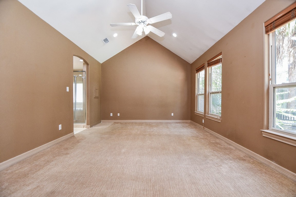 1240 Bingle Road Spring Valley Village, TX 77055 - Photo 20 of 49 an empty room with windows and fan