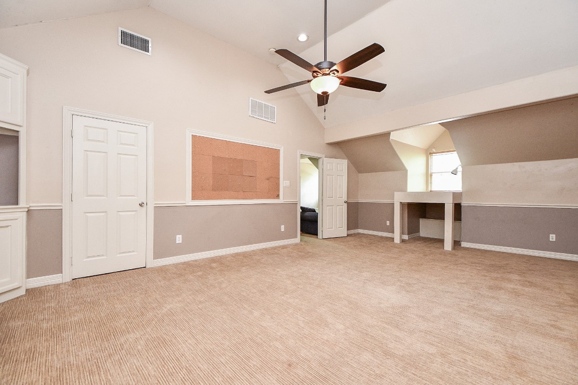 1240 Bingle Road Spring Valley Village, TX 77055 - Photo 28 of 49 Here is a view from the bookcase that was against the far wall and showed the ceiling fan with light kit and the bed frame against the far wall.