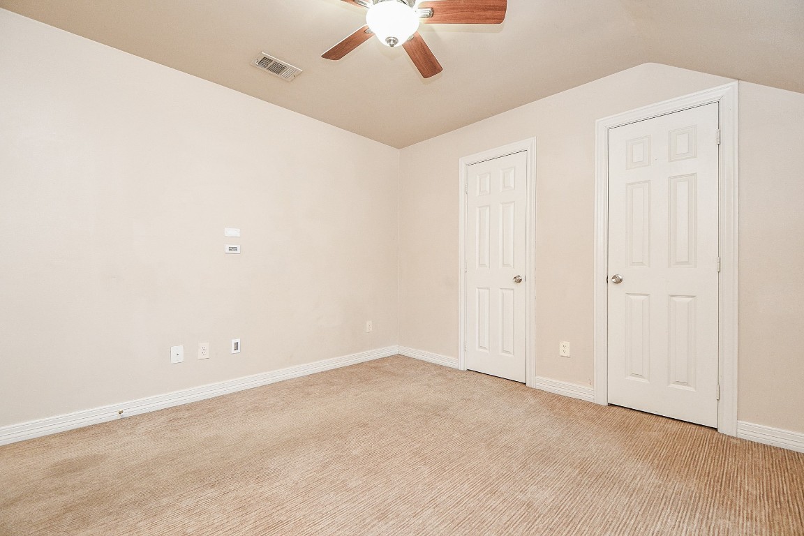1240 Bingle Road Spring Valley Village, TX 77055 - Photo 30 of 49 an empty room with a chandelier fan
