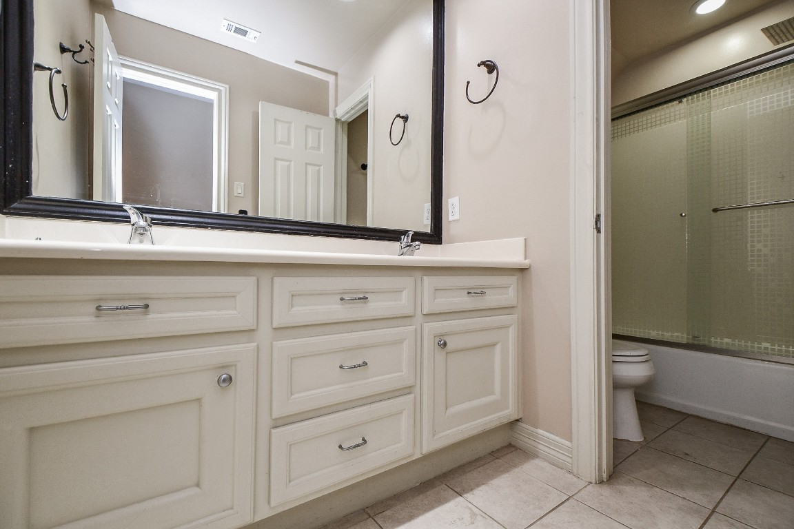 1240 Bingle Road Spring Valley Village, TX 77055 - Photo 33 of 49 This is the upstairs bath with lots of counter space and view of the separate toilet/tub area