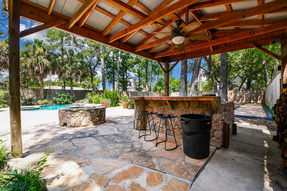 1240 Bingle Road Spring Valley Village, TX 77055 - Photo 38 of 49 a view of a patio with a table and chairs