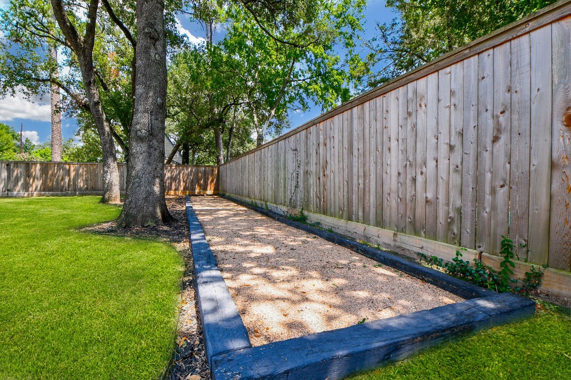 1240 Bingle Road Spring Valley Village, TX 77055 - Photo 39 of 49 The BOCCE ball court is one of this homes most unique features and the equipment is there to learn and enjoy the activity.