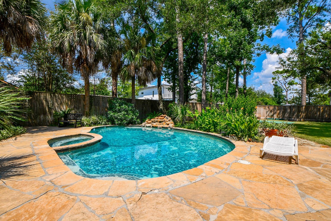 1240 Bingle Road Spring Valley Village, TX 77055 - Photo 41 of 49 a view of a swimming pool with a patio