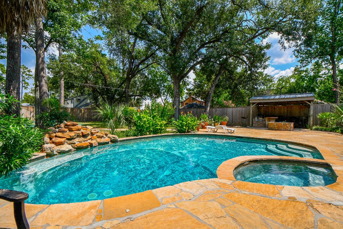 1240 Bingle Road Spring Valley Village, TX 77055 - Photo 42 of 49 a backyard of a house with yard and outdoor seating