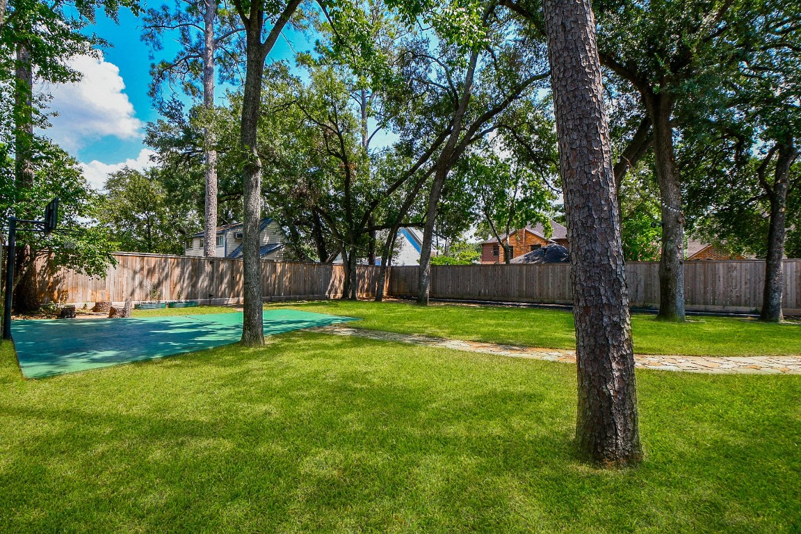 1240 Bingle Road Spring Valley Village, TX 77055 - Photo 45 of 49 a view of a yard with a tree